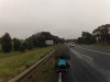 Alex riding on a wet road